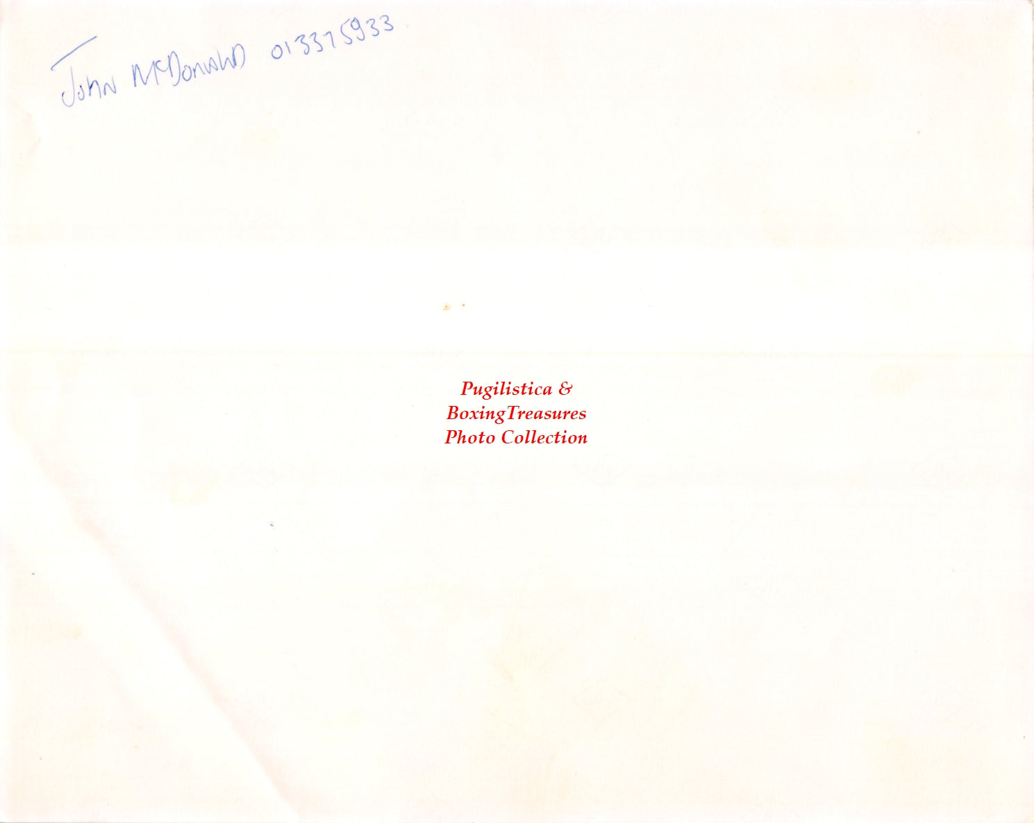 Boxing Photo #870 - John McDonald and Earnie Shavers