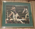 Luis Firpo knocks Jack Dempsey through the ropes Framed Print by George Bellows